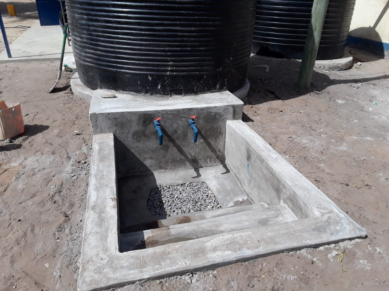 Water collection point with storage tanks and taps
